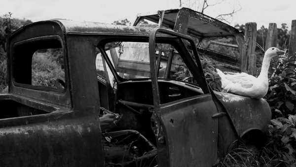 LITTLE BLOCK OF CEMENT WITH DISHEVELED HAIR CONTAINING THE SEA - still #1